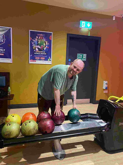 A memeber of the Hull Resettlement project taking part at the Changing Futures bowling event
