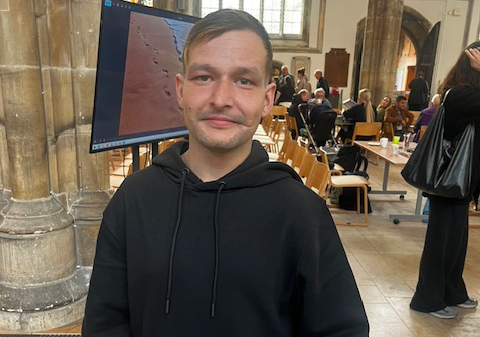 A photograph of one of the attendees after his haircut